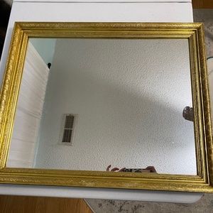 Gold trimmed mirror